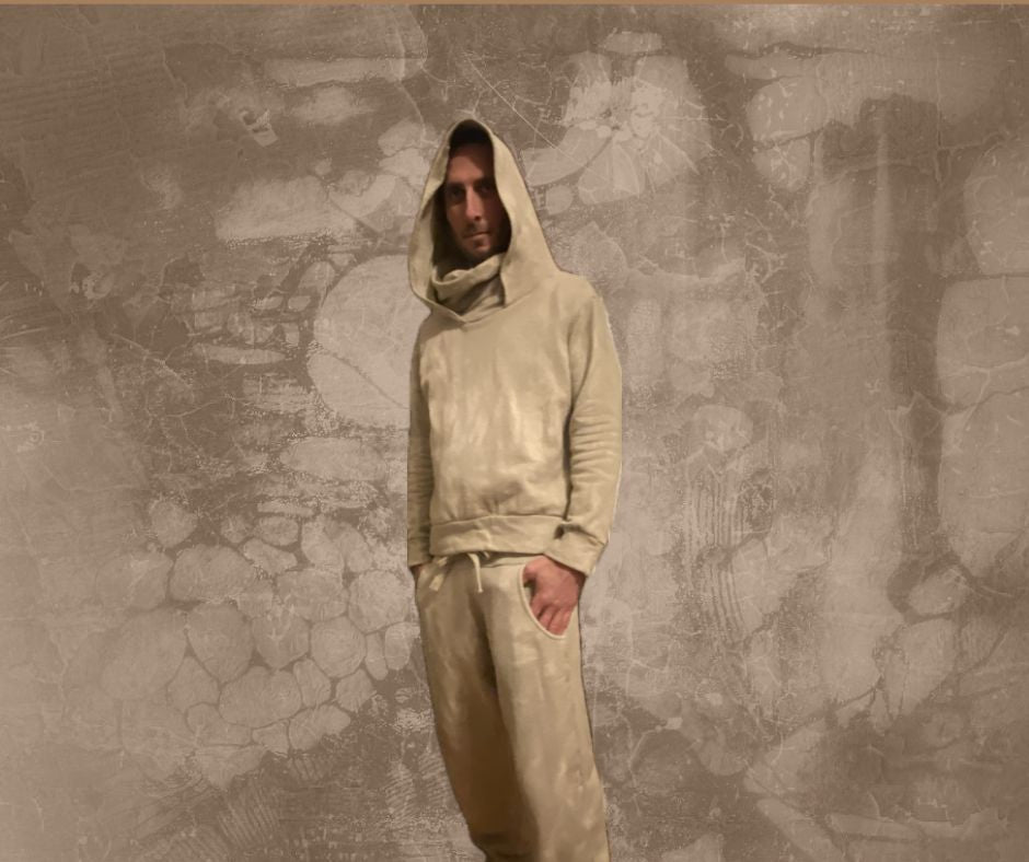 Man standing in hemp fleece hoody and hemp fleece jogging pants - all handmade and hand dyed with onion skins - color is sage green