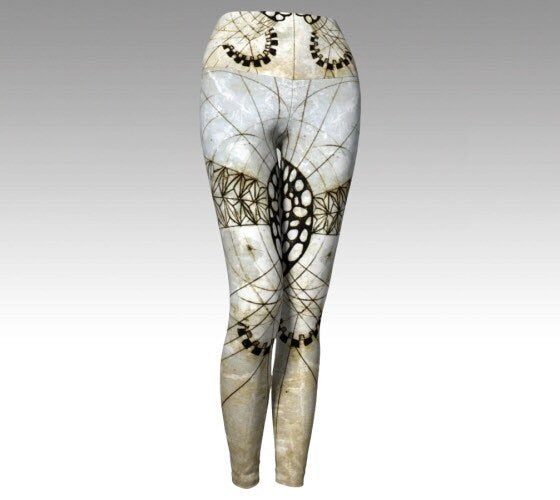 black and white and gold organic shapes  design on yoga leggings titled 'bird brain'