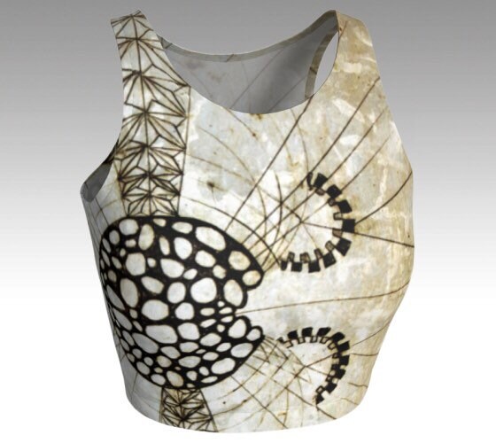 black and white and gold design of organic shapes on a yoga top