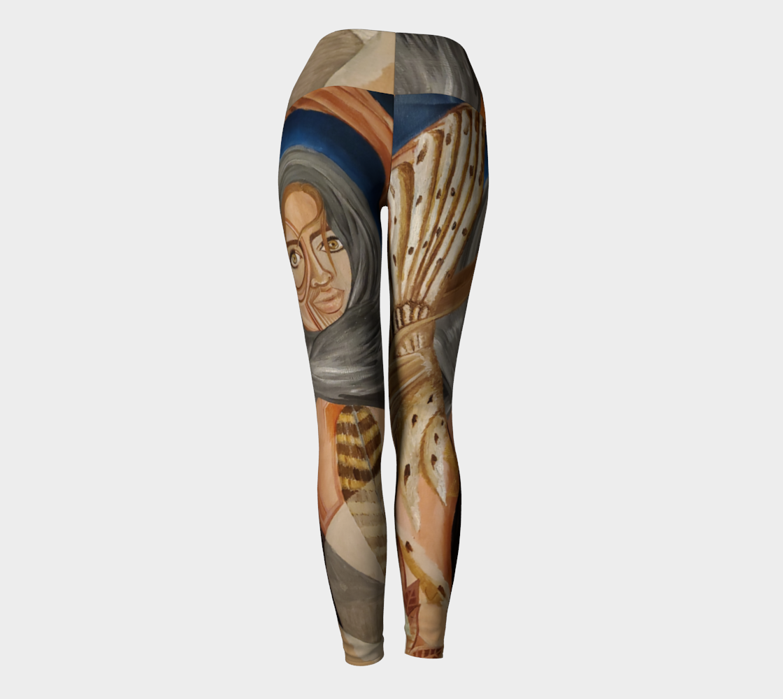 Yoga leggings in shades of blue and brown with a womans face and owl feathers painted in shades of white and tan and pink