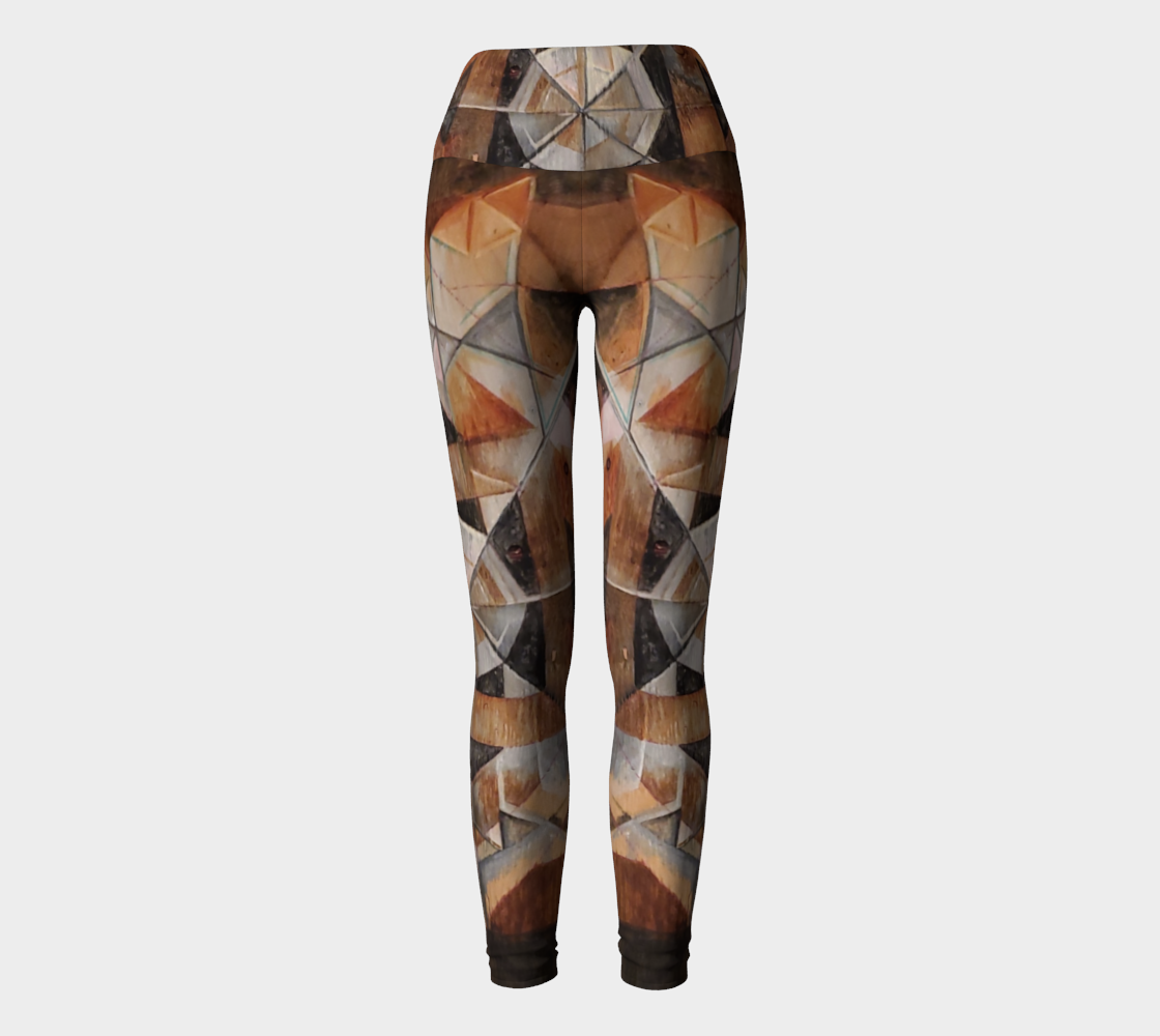 Yoga leggings with geometric pattern on wood grain with lines in black brown and rust and green