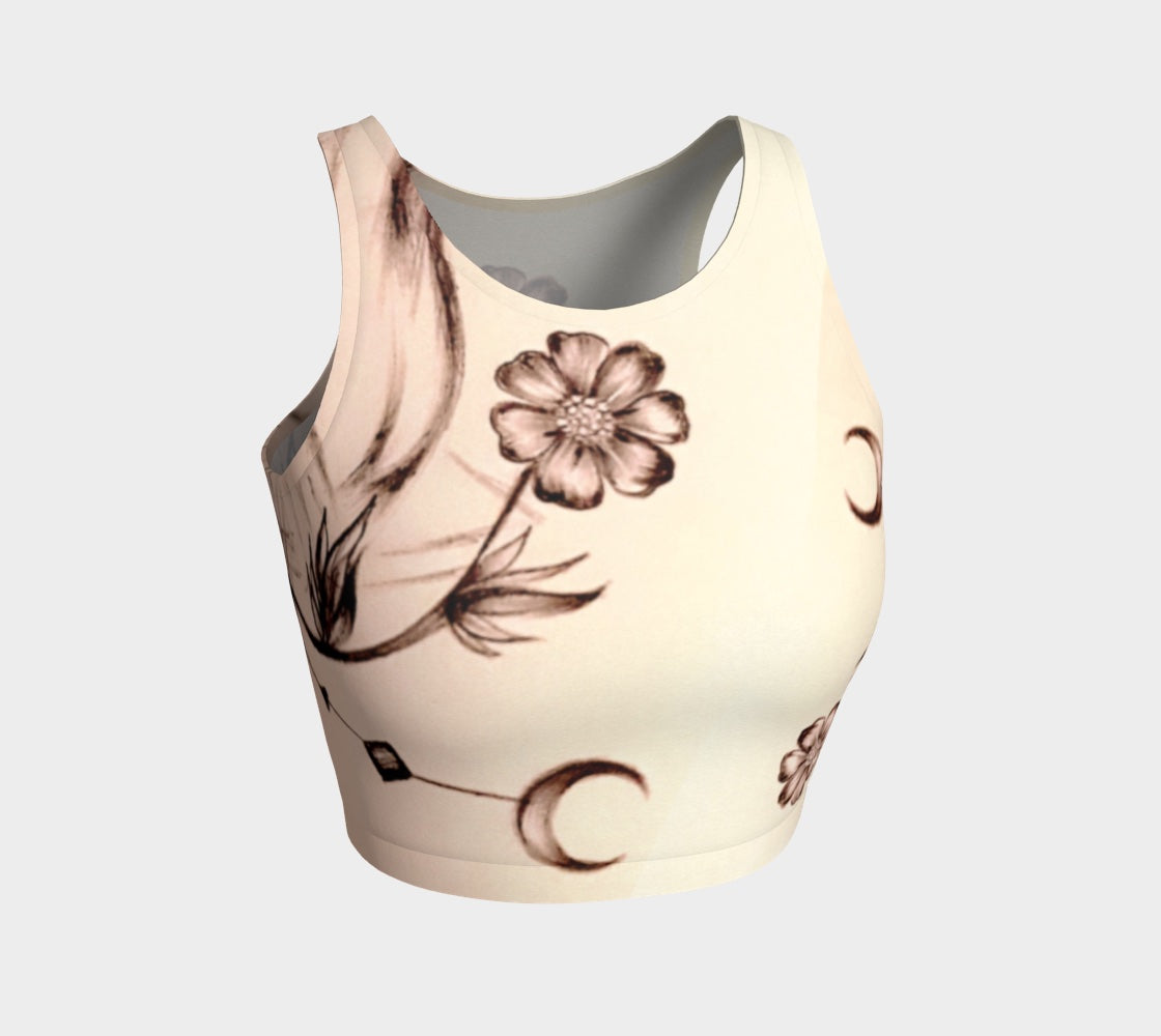 A white tank top with a floral pattern and crescent moons in pink and brown colors.
