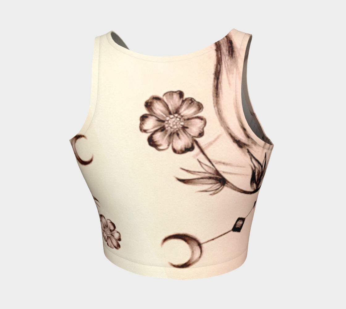 A white tank top with a floral pattern and crescent moons in pink and brown colors.