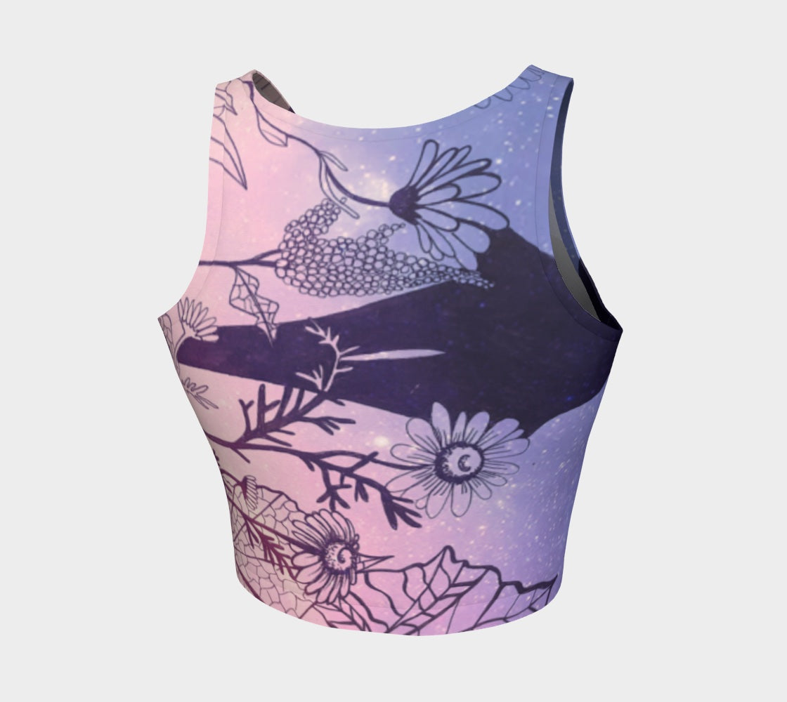 Yoga top in shades of pink and purple with plants in black