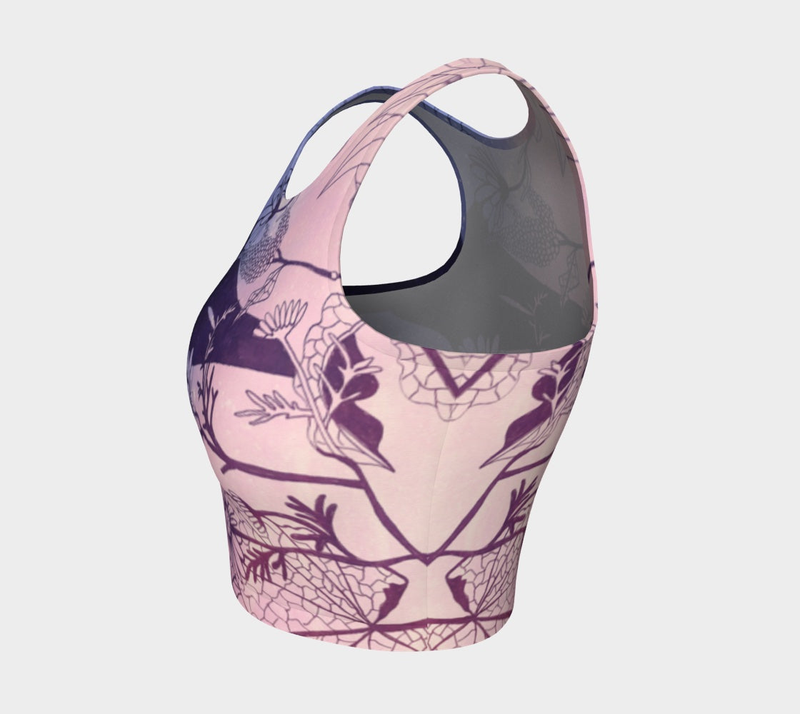 Yoga top in shades of pink and purple with plants in black