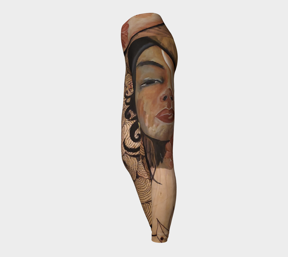 Yoga leggings with a woman face and reishi mushroom black lines painted on reclaimed wood with a gold earring and a red flower