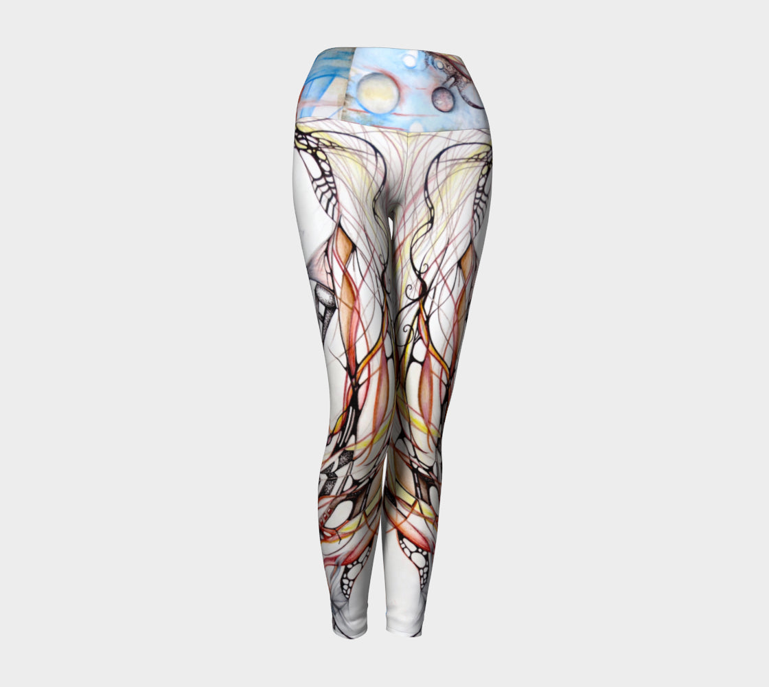 Yoga leggings with black and white lines and designs in organic shapes with shades of blue and red