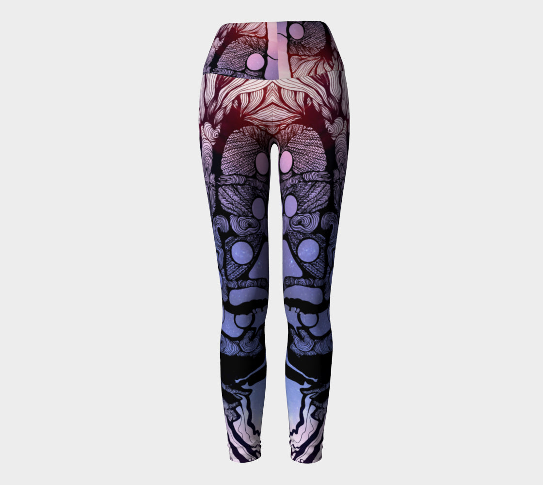 Yoga leggings in blue and purple with black line in the shape of a tree a woman and moons on them