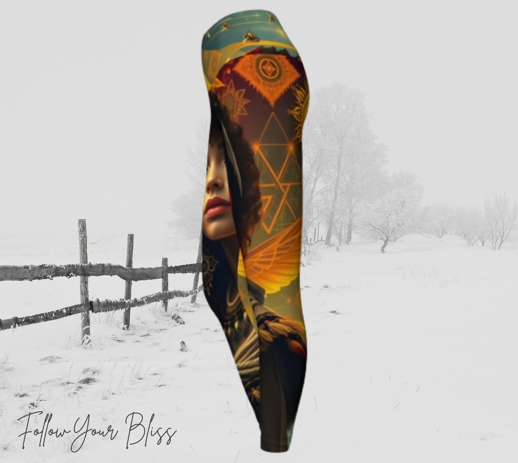 Galactic Honey Bee Hive Leggings - Portrait of a beautiful woman with bright teal eyes and honey bees flying around her - beautiful azure skies and earth toned geometric shapes surround her - she has golden wings. there&#39;s a sun on the back