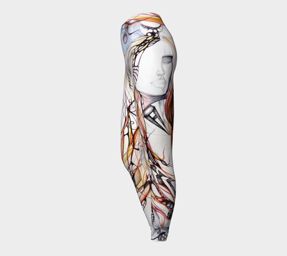 winds of change leggings in shades of black and white and red and blue with a womans face in an abstract design