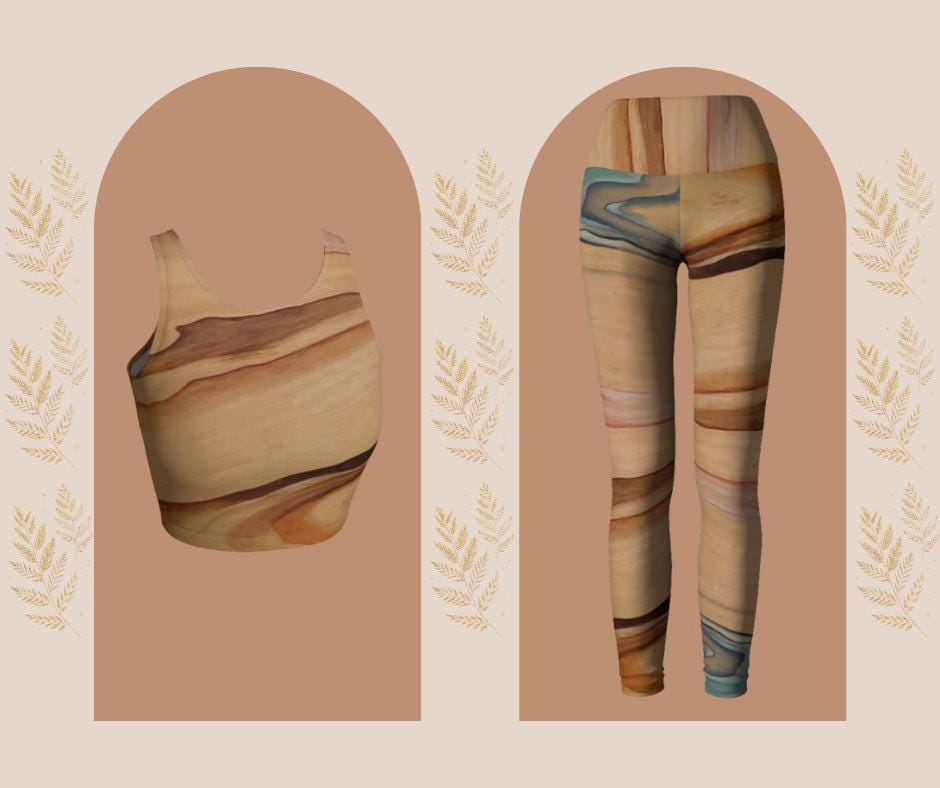 Yoga set in shades of brown blue and pink with a natural elemental design on them following the wood grain