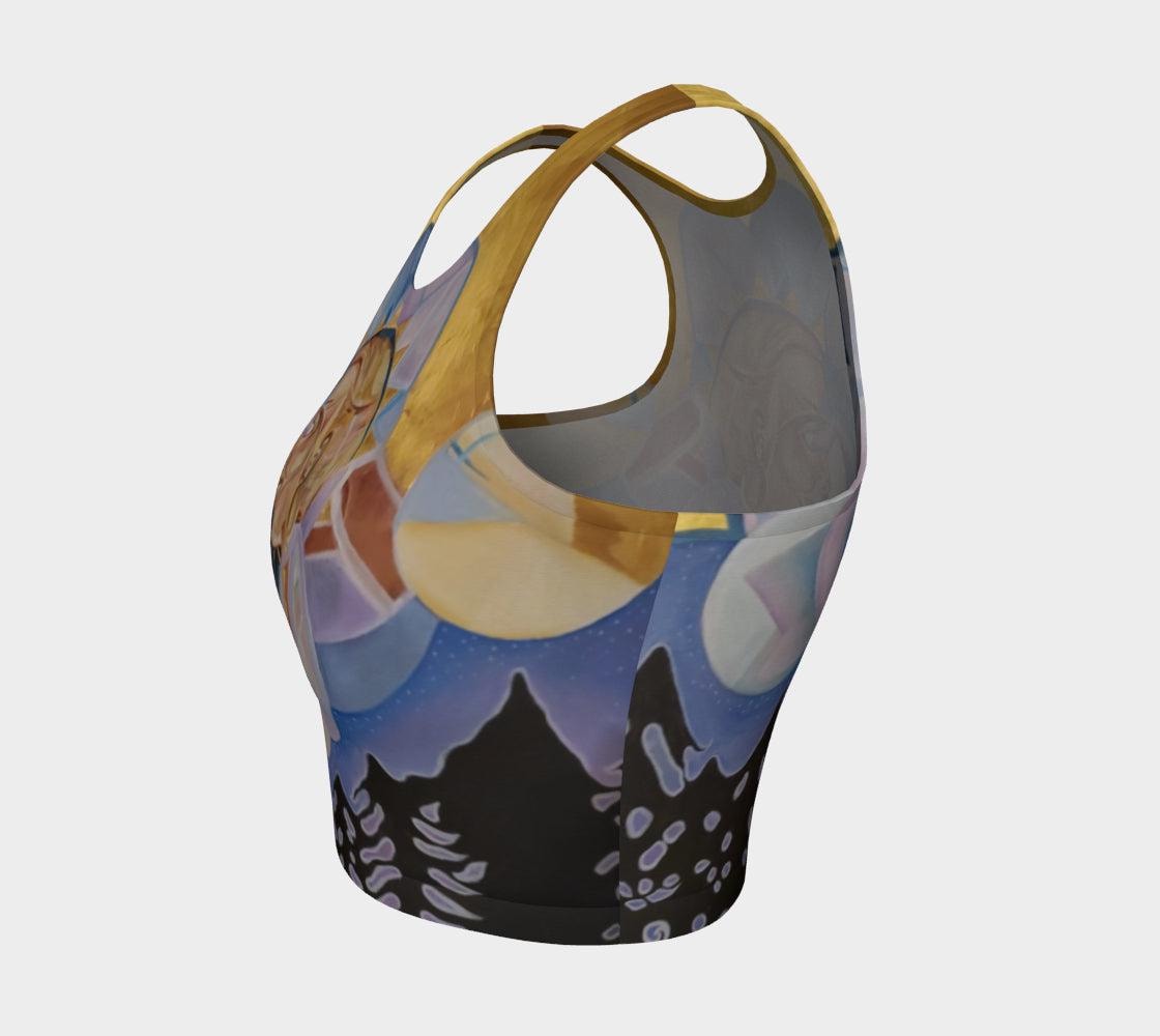 Yoga top in purple and blue hues with profile of a woman face in gold and tan and geometric designs