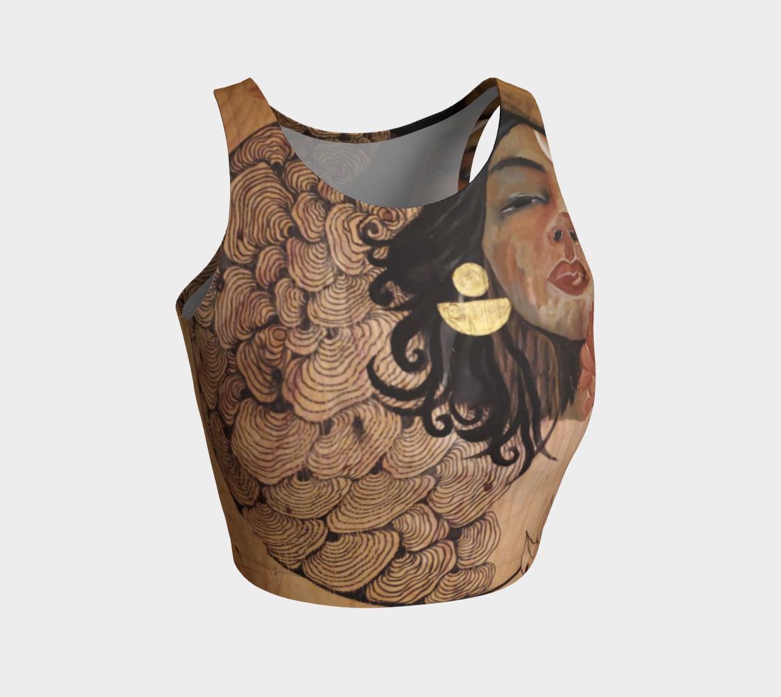 Yoga top of mushrooms painted in black lines and shades of brown and gold with a red flower and a womans face