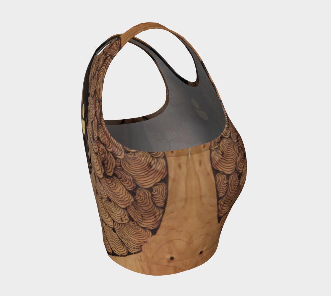 Yoga top of mushrooms painted in black lines and shades of brown and gold with a red flower and a womans face