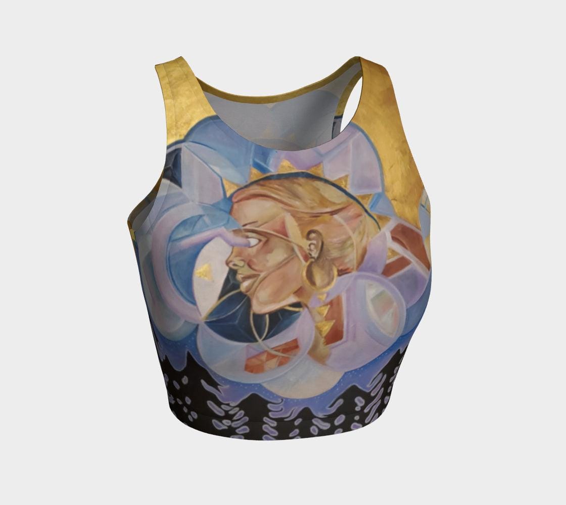 Yoga top in hues of purple and blue with a woman face in shades of gold and beige and geometric patterns