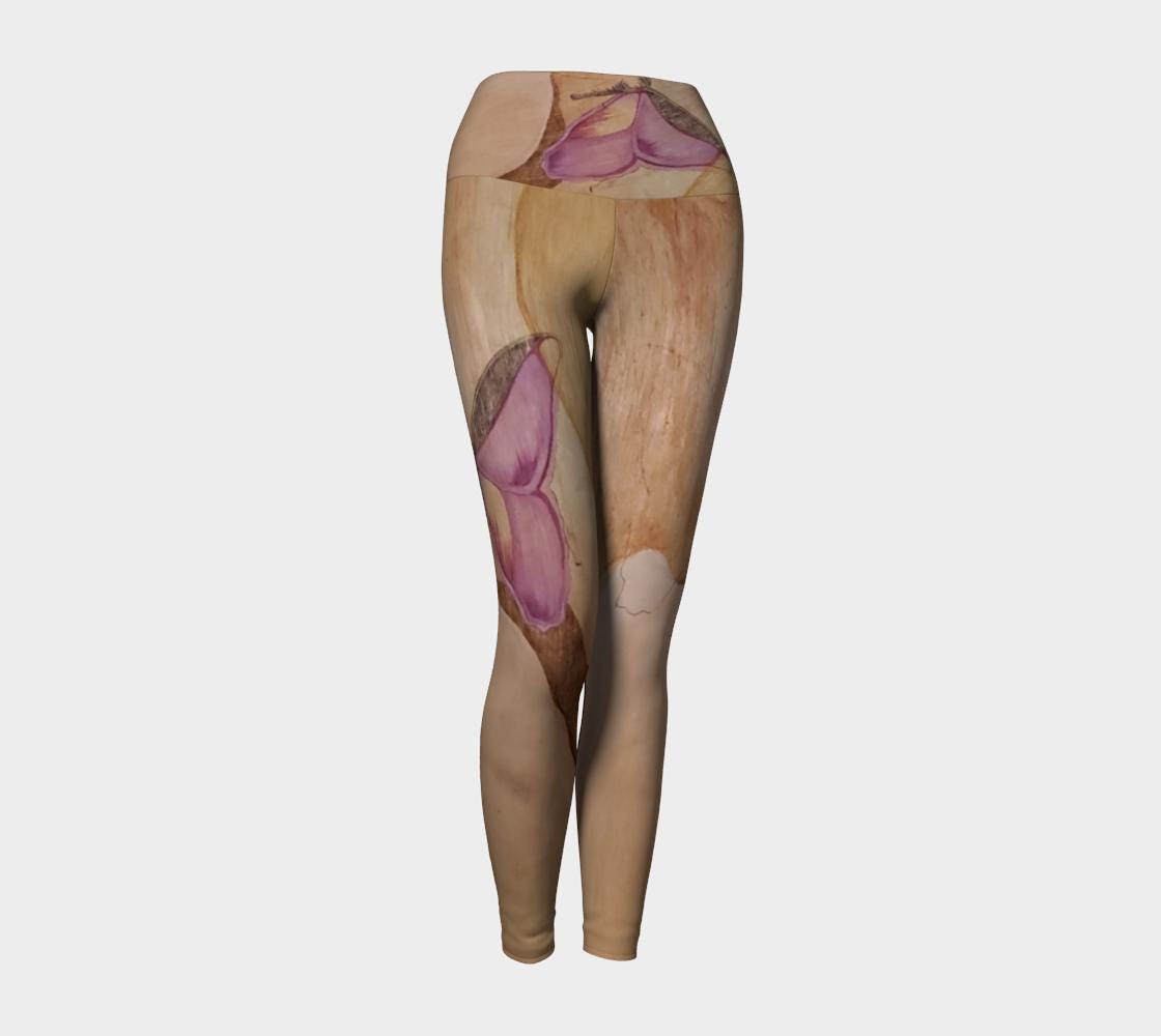 Yoga leggings with a wood grain and purple butterfly design on them