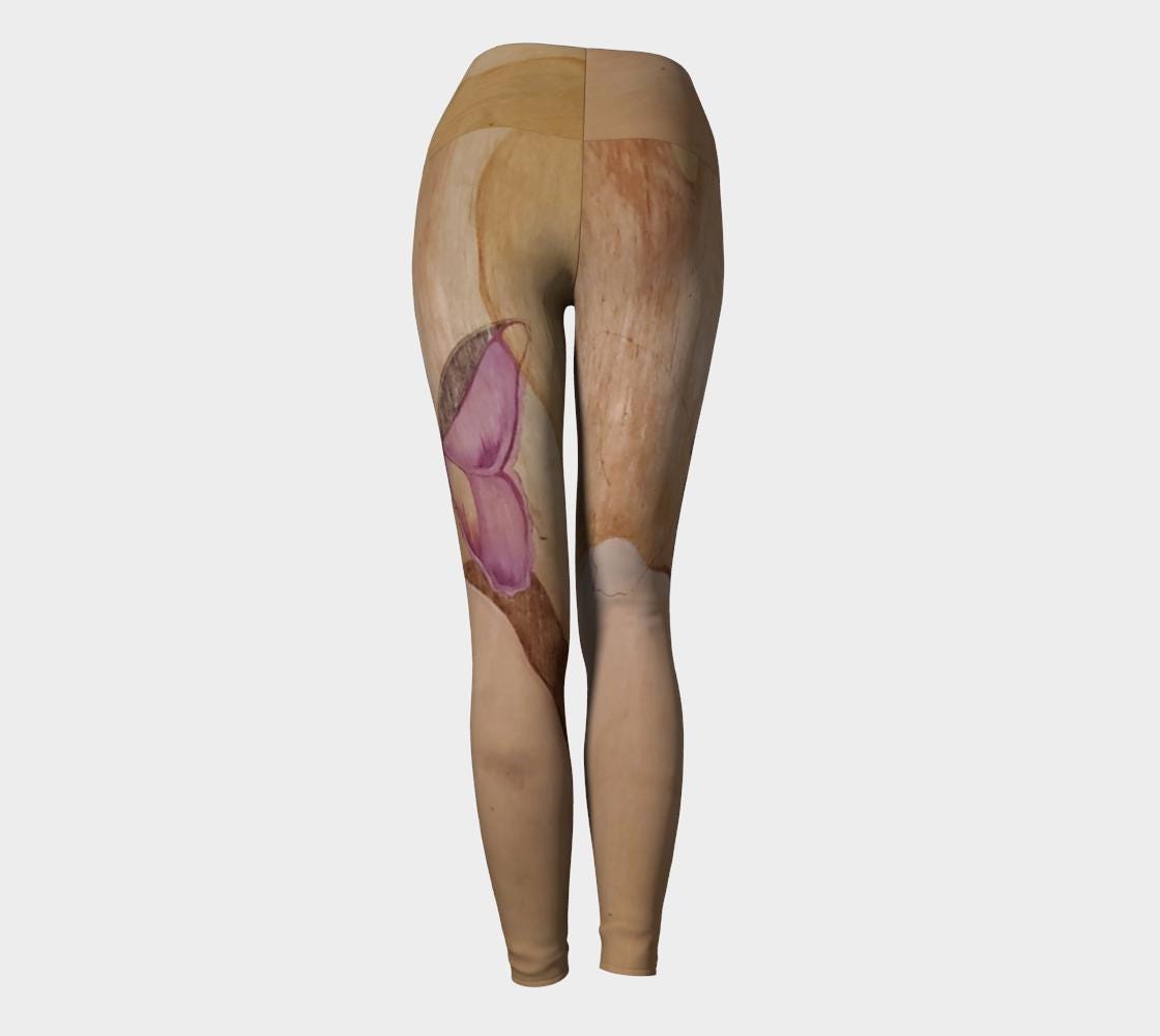 Yoga leggings with a wood grain and purple butterfly design on them