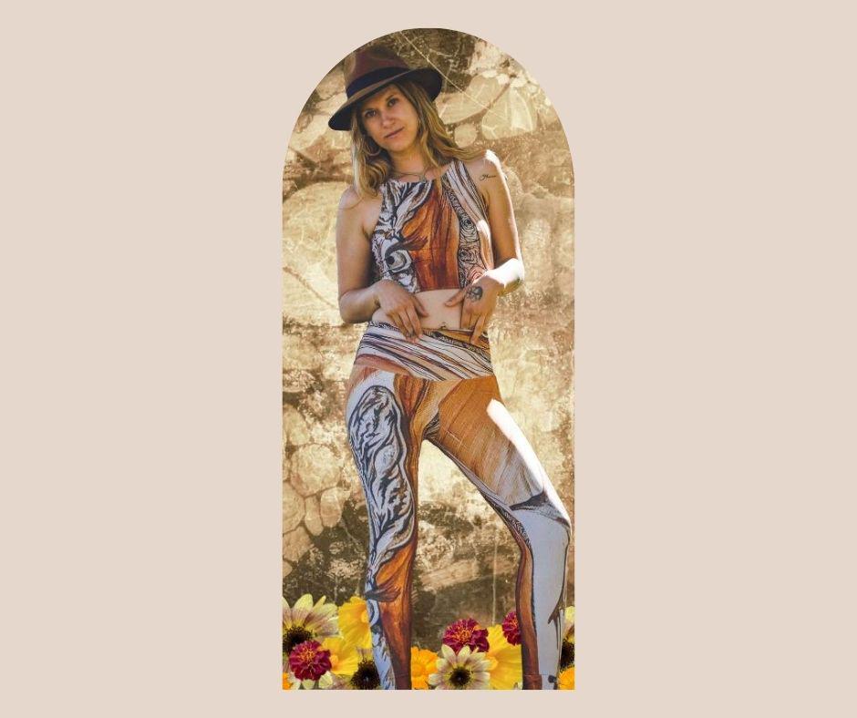 A set of yoga leggings and a yoga top with a floral and tree ring pattern in beige, brown, and black colors.