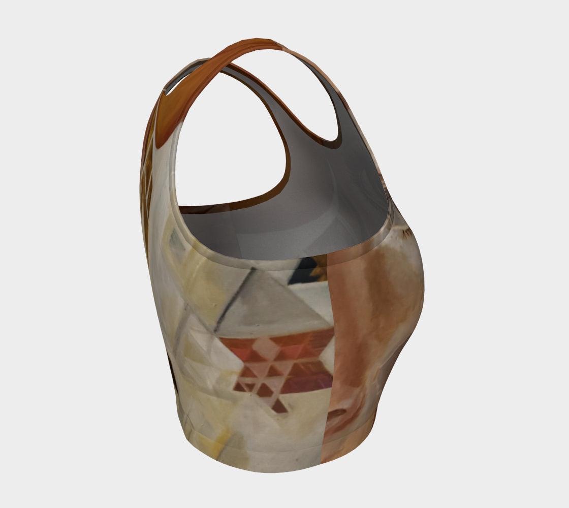 A crop top featuring a geometric pattern with diamonds in gold, black, and white, and wide open eyes on the front.