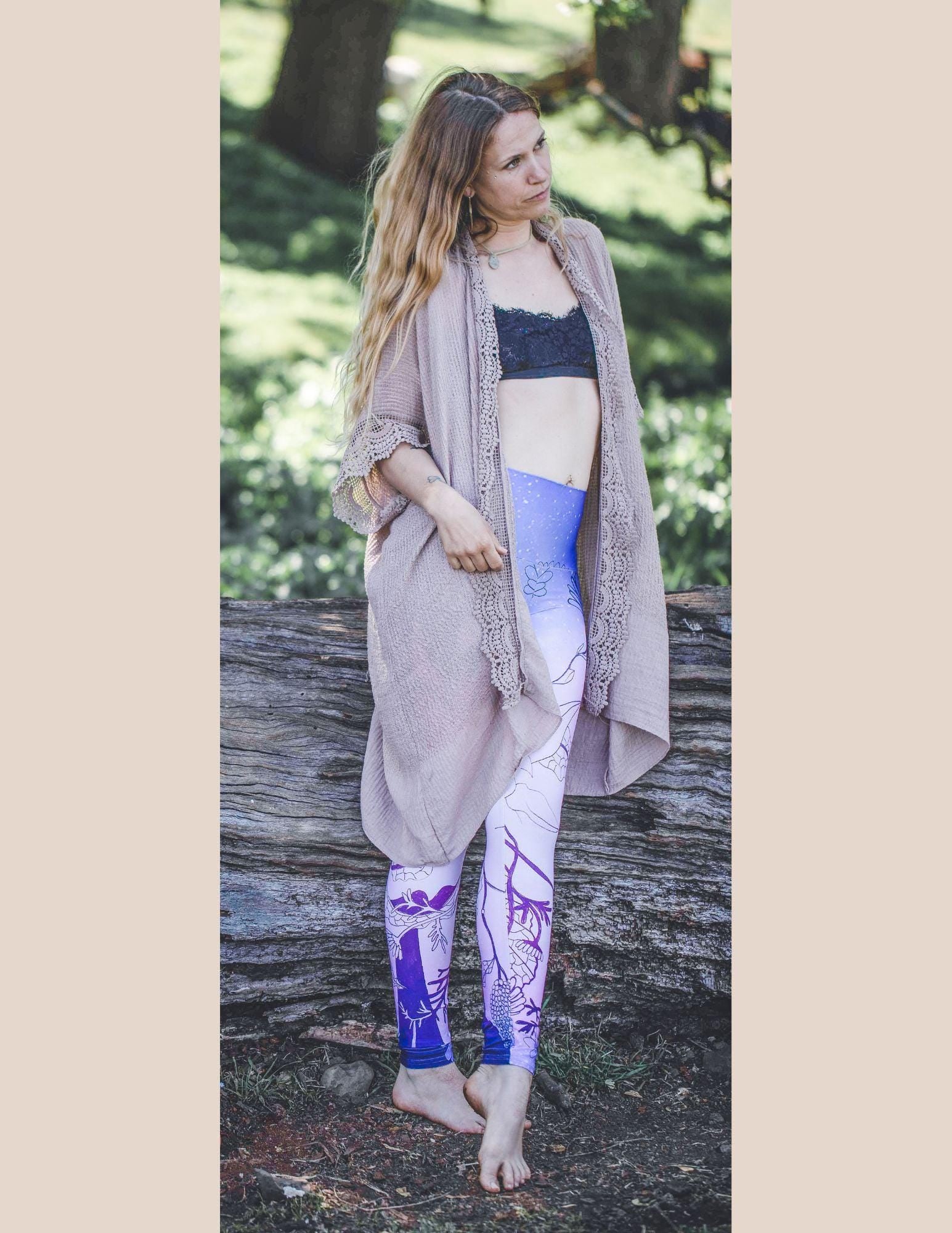 model wearing Yoga leggings in shades of pink and lilac with plants designs inline black lines on them