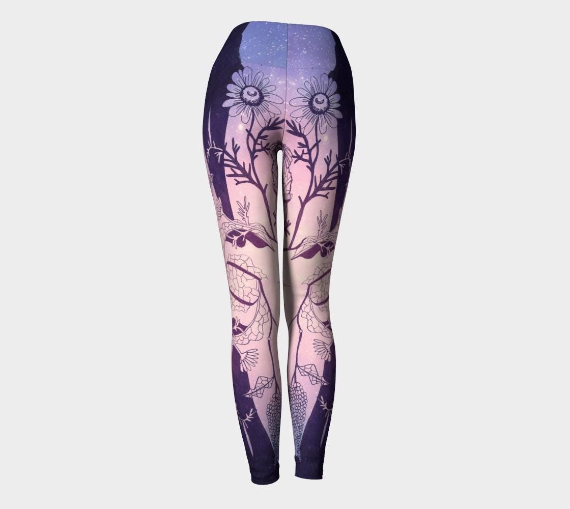 Yoga leggings in shades of pink and lilac with plants designs inline black lines on them