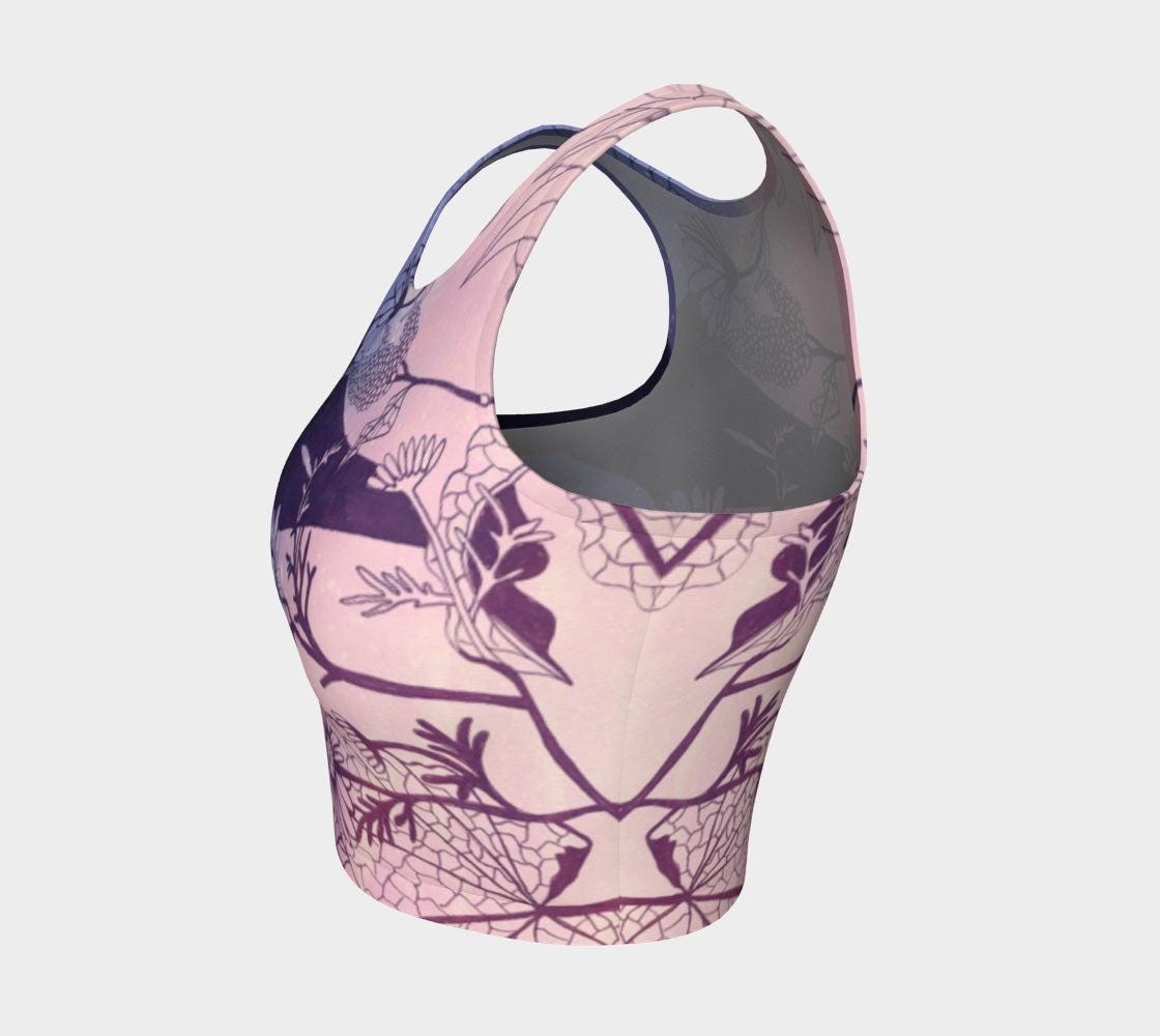 Yoga top in shades of pink and purple with plants in black