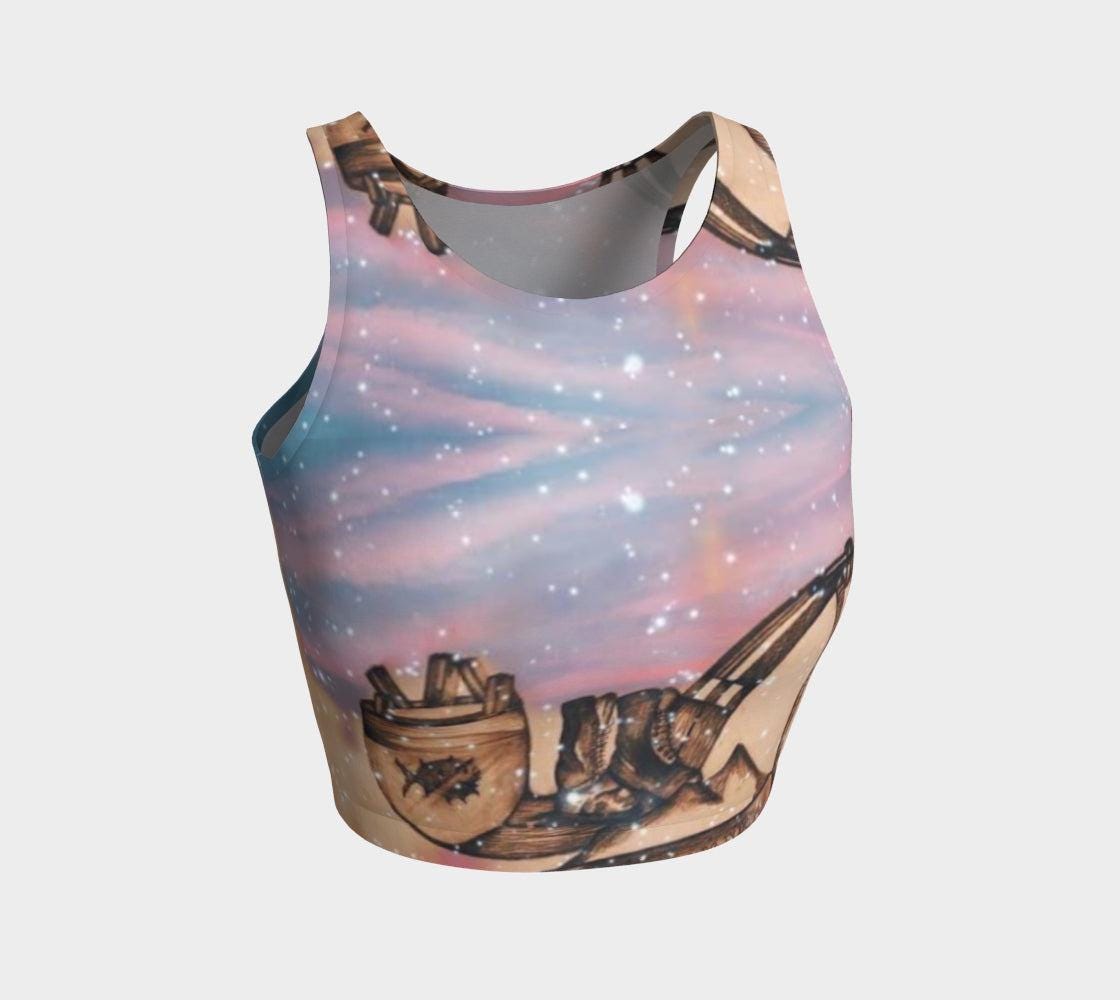 Yoga top in shades of pink and blue with a pencil drawing a little girl and stars flecked on it