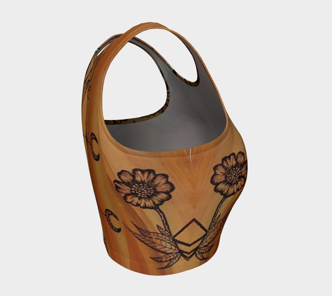 A cropped tank top with a floral leaf line and crescent moon designs on a golden brown background.