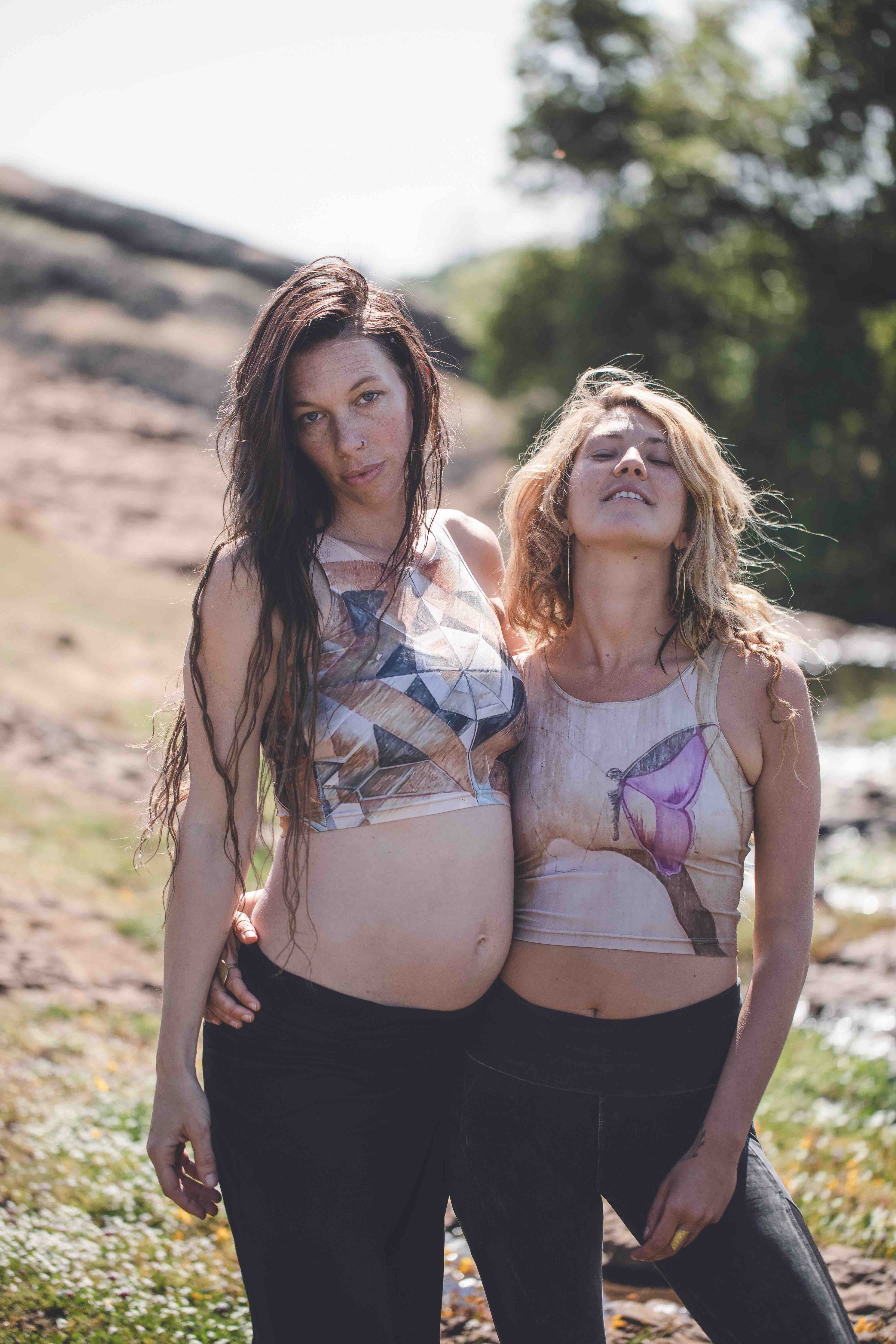 women standing in field